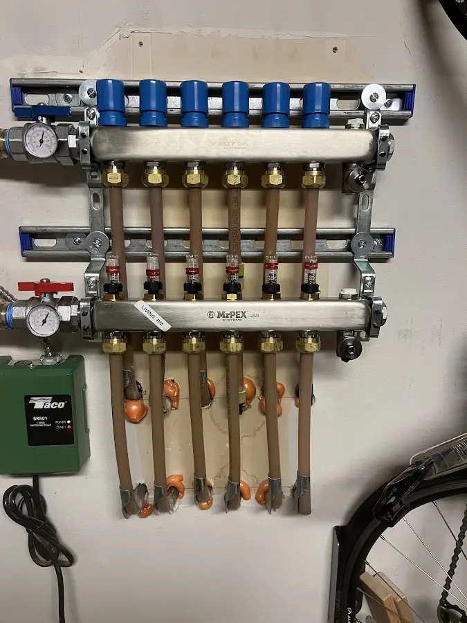 Plumber performing Water Heater Repair at a residential property in Garfield Heights